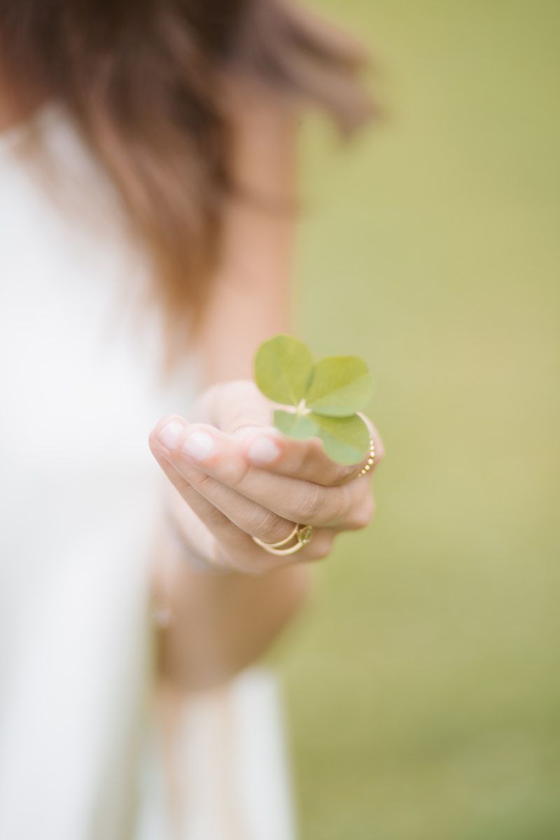 Bride holding four leaf clover at Upcountry Venue